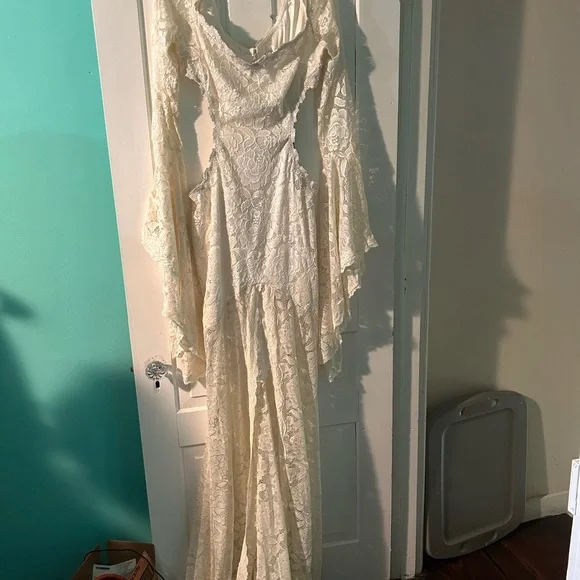 white lace halloween dress LaceMade Halloween Collection Bathed in moonlight, the pure white shell dress shimmers with divine grace, echoing the gentle elegance of goddess Hera descending to earth. Moonlight Hera Dress Available from 8AM 10th